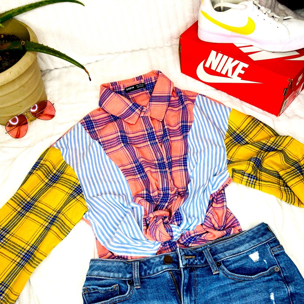 Pink and yellow striped shirt .